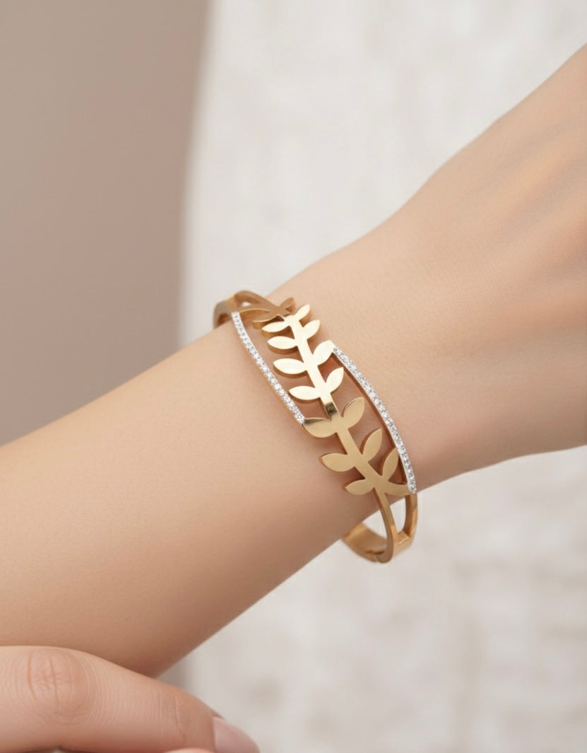 Gilded Fern Leaf Statement Bangle – Sparkling Crystal Cut-Out Cuff