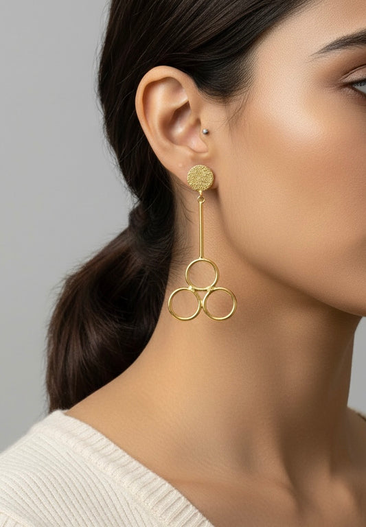 Gilded Trinity Drop Earring – Textured Gold-Tone Geometric Statement