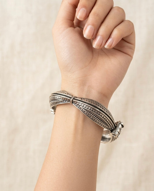 Nomadic Curved Kada – Oxidized Silver Statement Bangle with Tribal Engravings