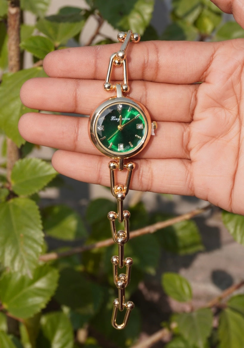 Emerald Dial Watch With Orbital Link Bracelet