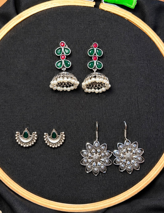 Artisanal Silver Harmony Trio – Emerald Kemp Jhumkas, Floral Drops & Crescent Stud Set