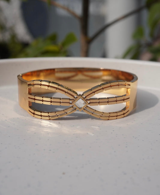 Gilded Infinite Bow Cuff Bracelet – Delicate Multi-Strand Gold-Tone