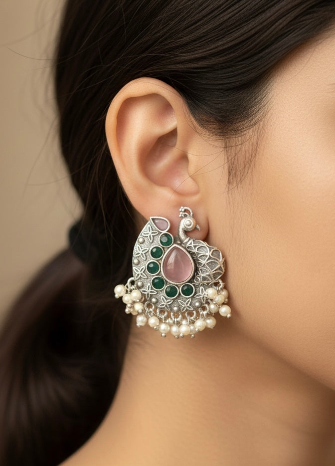 Peacock Motif Oxidised Silver Jhumka Earrings with Pearl Detailing