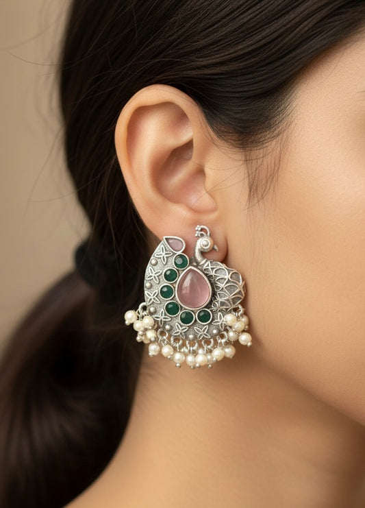 Peacock Motif Oxidised Silver Jhumka Earrings with Pearl Detailing