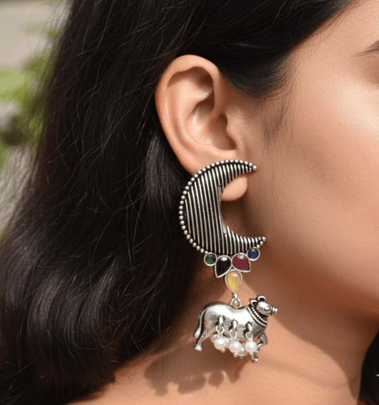 Silver Crescent Moon and Cow Motif Earrings with Gemstone Accents