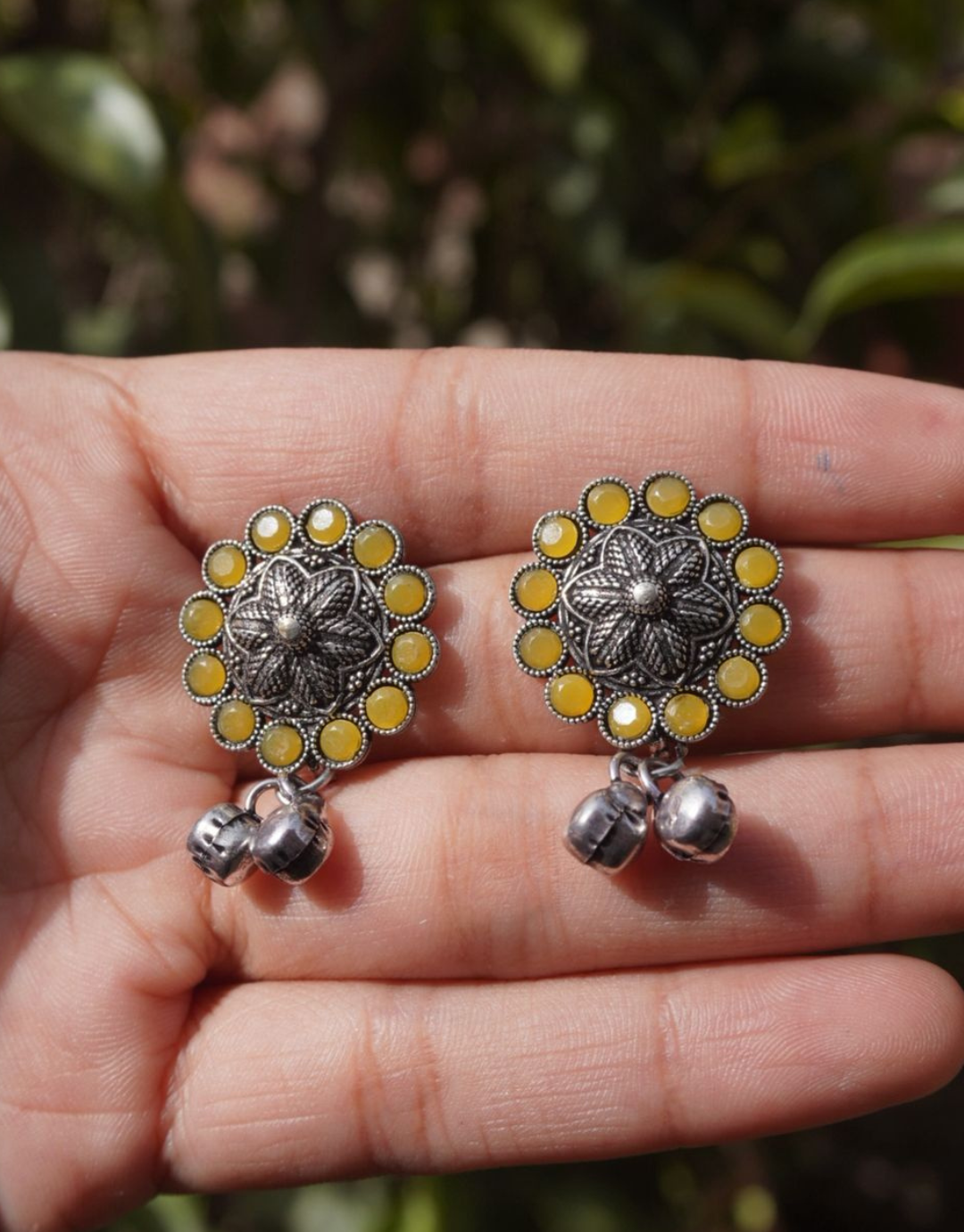 Oxidized Silver Floral Studs with Sun-Yellow Stones & Delicate Ghungroo Drops