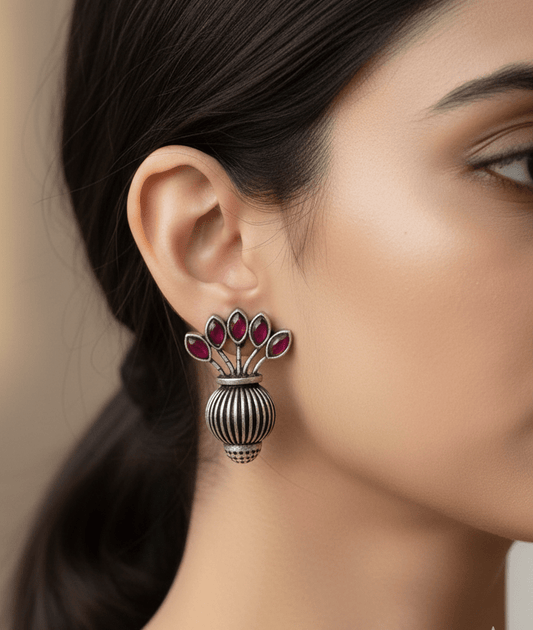Unique Floral Vase Oxidized Silver Stud Earrings with Ruby Red Stones